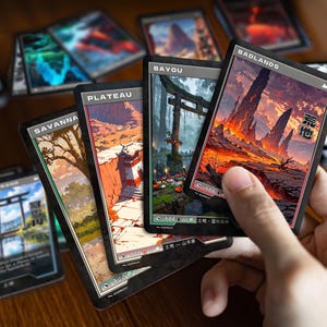 Printed Retro Japanese Lands cards in hand, showing real card size and finish