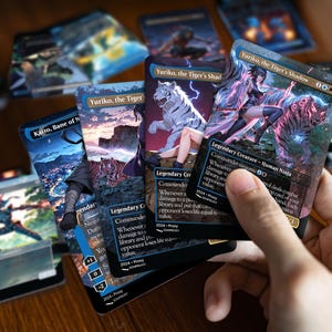 Printed Yuriko Ninjas proxy cards in hand, showing real card size, finish and anime artwork