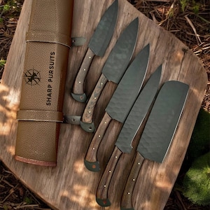 5-piece black coated stainless steel knife set, ergonomic handles, non-reflective coating, Stealth Blade Knife Set
black coated stainless steel knife set with cleaver, chef, fillet, steak, and pairing knivesKnives set with Sweet leather Roll