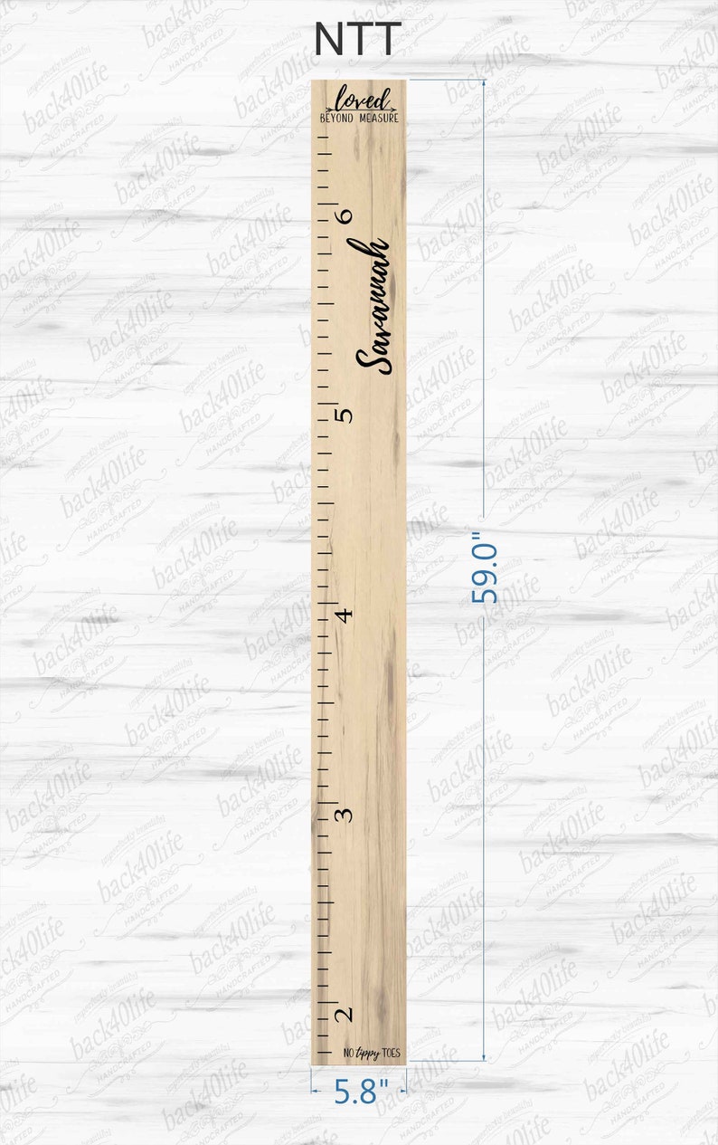 May include: A wooden growth chart with a ruler measuring up to 6 feet. The chart is painted in a light wood color and has a black inscription that reads "Loved Beyond Measure" and "Savannah". The chart is 5.8 inches wide and 59 inches tall.