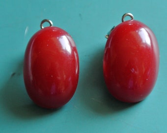 Collectible vintage 1940s unused oval opaque dark cherry red tested bakelite earclips