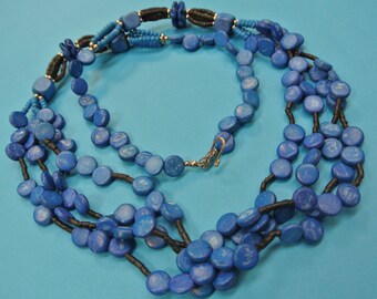 Handmade vintage 1970s unused blue natural organic coconut wood bead necklace with 3 rows front, made in the philliphines