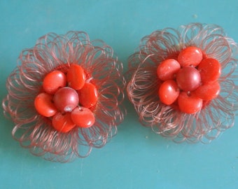 Pair of larger vintage 1950s timetypical unused red glass bead/ plastic thread design earclips earrings with brass clips, still on card