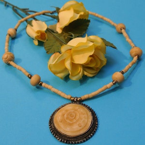 Vintage 1960s Bone Pendant Necklace: Handcrafted Tribal Boho Jewelry