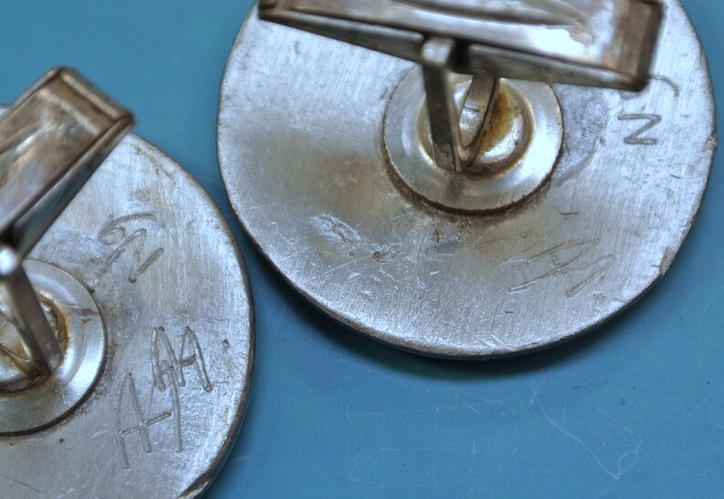 Pair of vintage 1960s round signed SV.T.JW design pewter cufflinks with abstract pattern