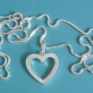 Sweden vintage 1990s short stamped 835 S sterling silver heart shape pendant necklace with stamped 925 S silver chain