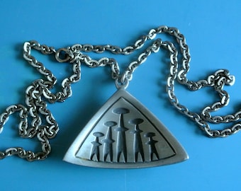 Vintage 1960s Swedish triangular handcrafted pewter pendant necklace with 5 figure motive motive and metal chain, marked 3 crowns TENN