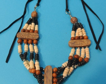 Handmade vintage 1970s unused bone white/ brown/ black 4-rows natural organic coconut wood/ teak wood bead necklace made in the philliphines