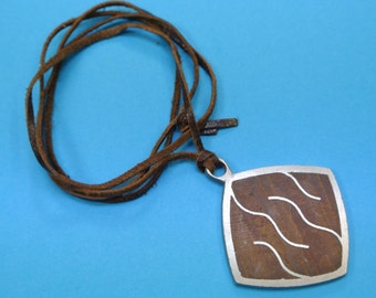 Rare signed vintage 1960s Swedish handcrafted square metal pendant necklace with abstract motive and teak wood inlays