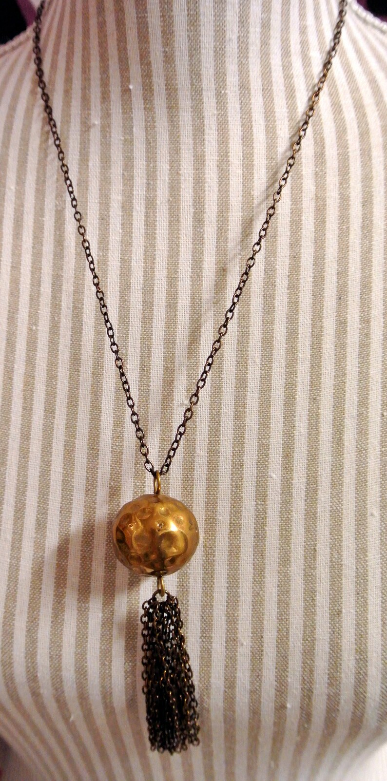 Rare vintage 1950s adjustable round handworked goldcolor brass bead pendant necklace with copper chain and tuft