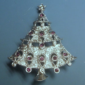 Lovely vintage 1980s unused silvercolor metal Christmas three brooch with 12 grinded purplered rhinestones and backside securety pin