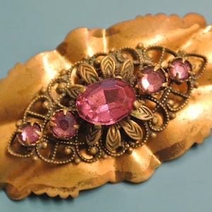 Old/ antique SWEDISH early 1900s handmade oval brass brooch with 5 pink grinded glass stones