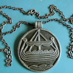 Vintage 1960s swedish handcrafted round viking-ship pewter pendant necklace with metal chain, signed lg BB handarbete