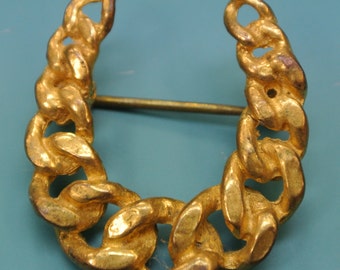 Small SWEDISH vintage 1950s goldcolor brass link horse-shoe-formed  brooch