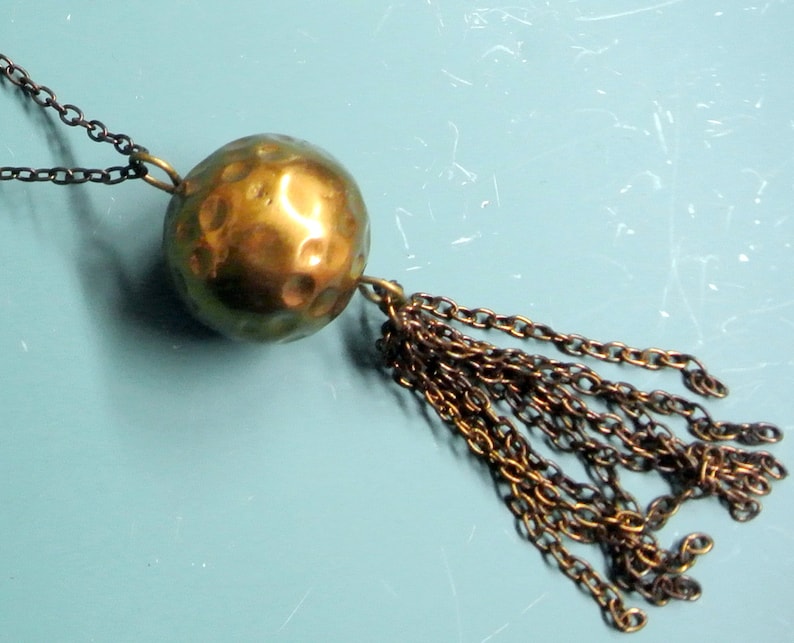 Rare vintage 1950s adjustable round handworked goldcolor brass bead pendant necklace with copper chain and tuft