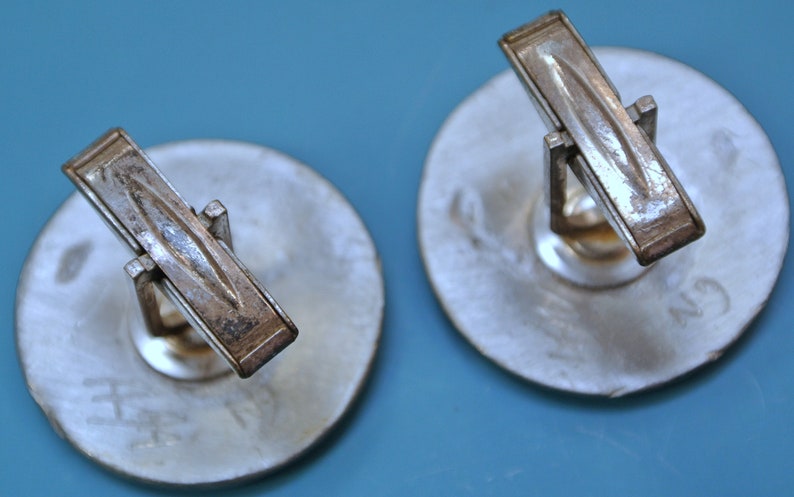 Pair of vintage 1960s round signed SV.T.JW design pewter cufflinks with abstract pattern