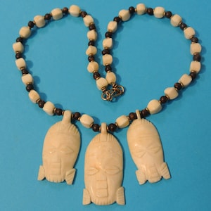 Vintage Bone Choker: 1960s Tribal Buddha Pendants, Brass Accents
