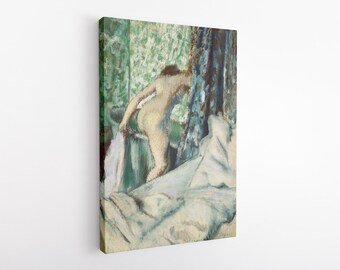 May include: A canvas print of an impressionist painting depicting a nude figure in a green and blue-toned setting. The figure is partially obscured, with a focus on the back and a draped white cloth.
