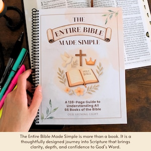 May include: A spiral-bound book titled "The Entire Bible Made Simple" with a cream-colored cover. The cover features illustrations of a cross, dove, crown, and open book. The book is a 138-page guide to understanding the Bible.