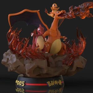 May include: A three-dimensional figurine of three Pokemon characters: Charizard, Charmeleon, and Charmander. The figures are posed on a base with a black and red Pokemon logo and the number "005". The figures are surrounded by flames.