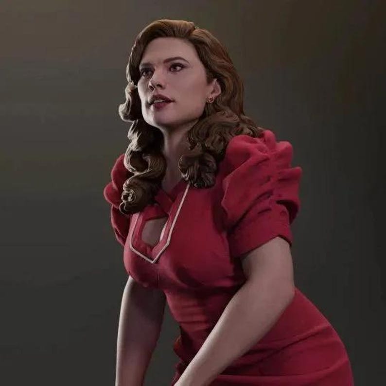 Puede incluir: Una mujer con el pelo largo y casta&ntilde;o lleva un vestido rojo con ribete blanco. El vestido tiene un escote de coraz&oacute;n y mangas cortas.