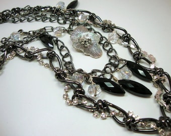 Statement Necklace, Multi Strand, Black Temptress Gunmetal Black Multi Chain Black and Clear Crystals Flower
