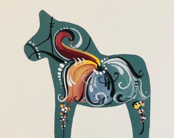 May include: A hand-painted wooden Dala horse with a blue, green, yellow, red, and white floral design.