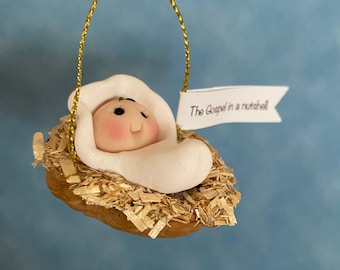 Baby Jesus Christmas Ornament Gospel in a nutshell ornament