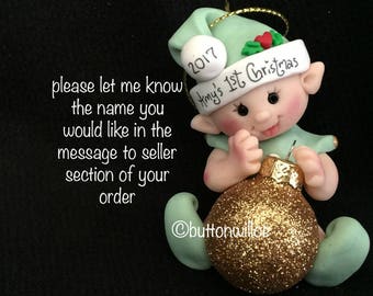 Baby's First Christmas Ornament Green for baby boy or baby girl  Elf Ornament, Green Elf Ornament holding gold glitter ornament