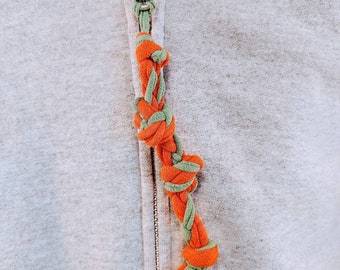 Sensory jewelry zipper pull chew burnt orange and green
