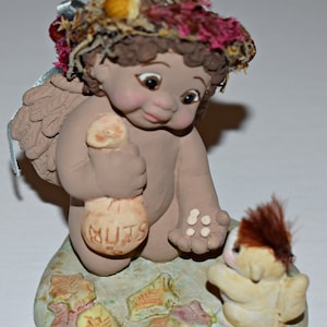 Dreamsicles Figurine - Brown Baggin&#39; - 1996 Cast Art - Cherub Angel Figurine - Dreamsicles DC716 - Collectible Figurine - In Original Box
