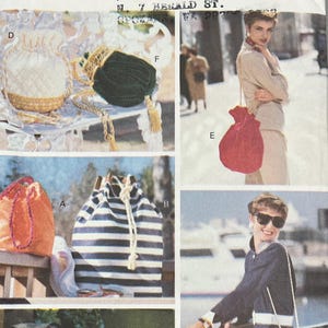 May include: A Vogue Patterns 8070 sewing pattern envelope for drawstring bags. The cover features illustrations and photographs of various bags in different fabrics, including striped, solid, and plaid designs, with drawstring closures and straps.