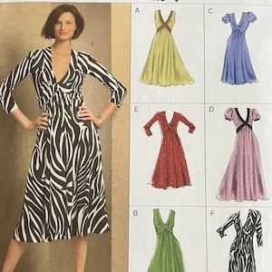 Może przedstawiać: Wzór szycia Vogue Easy Options V8489. Wzór przedstawia kobietę w sukience w zebrę. Inne style sukienek obejmują jednolite kolory i różne długości rękawów. Rozmiar wzoru to (18-20-22-24).