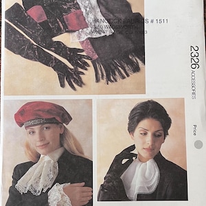 May include: A sewing pattern for accessories, featuring two women wearing different styles of collars and hats. The pattern is from Kwik-Sew Pattern Co., Inc. and is number 2326.