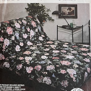 May include: McCall's Home Decorating pattern envelope featuring a floral design. The pattern number is 6474. The envelope includes instructions for making a variety of chair covers, a futon cover, and a shirred panel screen.
