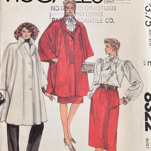 May include: A vintage McCall's sewing pattern envelope featuring three women's clothing designs. The pattern is for a Halston design and includes a white cape, a red coat with a skirt, and a white blouse with a red skirt. The pattern number is 8322 and the bust size is 36.