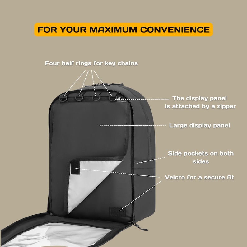 May include: Black backpack with a large zippered compartment, side pockets, and a velcro closure. The backpack has four half rings for key chains and a large display panel.