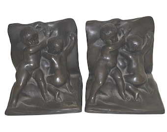 VINTAGE RONSON Cherubs bookends waxed marble paper backing material pending