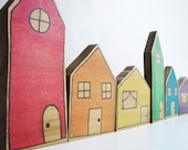 Un jouet d’apprentissage empilant, construire et faire semblant - Rainbow Village Blocks - Waldorf et Montessori inspirés