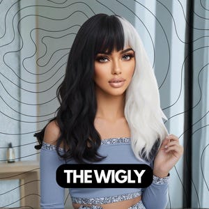 May include: A woman wearing a two-toned wig with black and white sections. The wig has bangs and wavy hair. The woman is wearing a light blue off-the-shoulder top. The text "THE WIGLY" is displayed on a black oval.