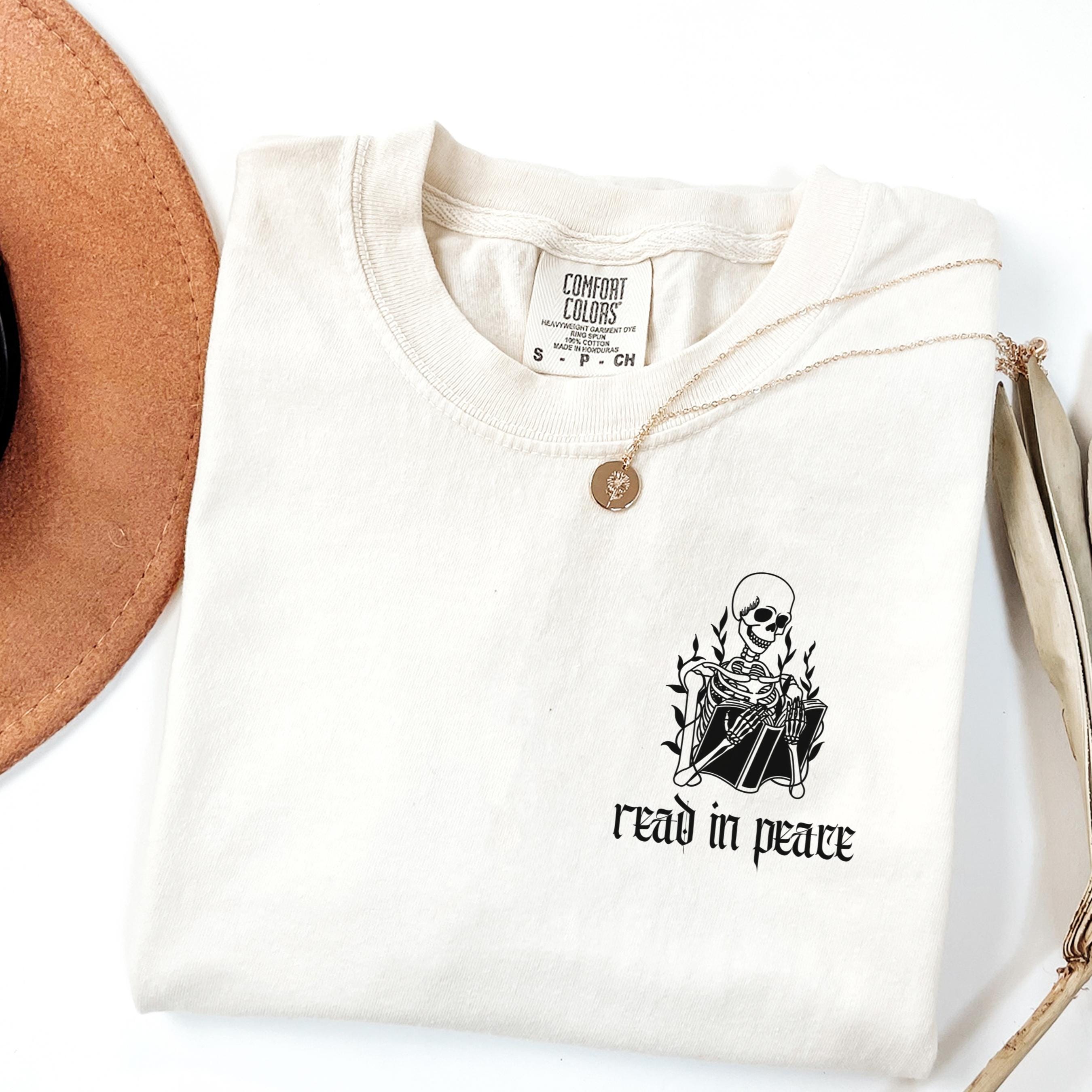 Halloween Read In Peace Shirt, Halloween Skeleton Reading T-Shirt, Funny Halloween Shirt, Book Lover Halloween Gift, Spooky Reading T-Shirt