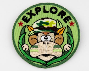 Monkey in Camouflage Helmet Explore Embroidered Iron-On Patch from France - 2 3/16-inches wide (56 mm) - per single patch