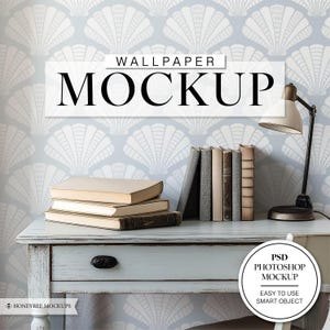 May include: A mockup of a wallpaper design featuring a repeating pattern of white seashells on a light blue background. The wallpaper is displayed on a whitewashed wooden table with a lamp and books. The text "WALLPAPER MOCKUP" is displayed in a white box on the wallpaper. The text "PSD PHOTOSHOP MOCKUP EASY TO USE SMART OBJECT" is displayed in a white circle on the bottom right corner of the image.
