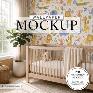 May include: A light-colored wooden crib with a white blanket and a plush rabbit toy sits against a wall featuring wallpaper with a colorful jungle animal pattern. The wallpaper displays illustrations of lions, giraffes, monkeys, and crocodiles.