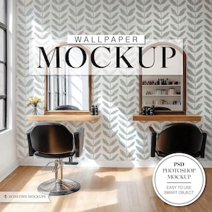 May include: A mockup of a wallpaper design featuring a repeating pattern of gray leaves on a white background. The wallpaper is displayed in a salon setting with two black salon chairs and mirrors. The text "WALLPAPER MOCKUP" is displayed at the top of the image. The text "PSD PHOTOSHOP MOCKUP" is displayed in a circle at the bottom right of the image. The text "EASY TO USE SMART OBJECT" is displayed below the circle.