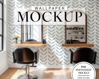 May include: A mockup of a wallpaper design featuring a repeating pattern of gray leaves on a white background. The wallpaper is displayed in a salon setting with two black salon chairs and mirrors. The text "WALLPAPER MOCKUP" is displayed at the top of the image. The text "PSD PHOTOSHOP MOCKUP" is displayed in a circle at the bottom right of the image. The text "EASY TO USE SMART OBJECT" is displayed below the circle.