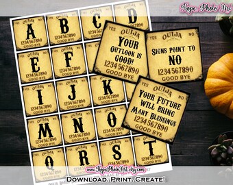 May include: A set of 20 printable Ouija board planchette cards featuring letters, numbers, and messages. The cards are designed in a vintage style with a yellowed background and black text. The cards are perfect for a Halloween party or spooky themed event.
