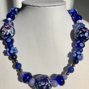 161/2 Choker made with stainless steel, lapis lazuli, torch fired beads. Cobalt blue and lavender tones. Metal leaf clasp image 3