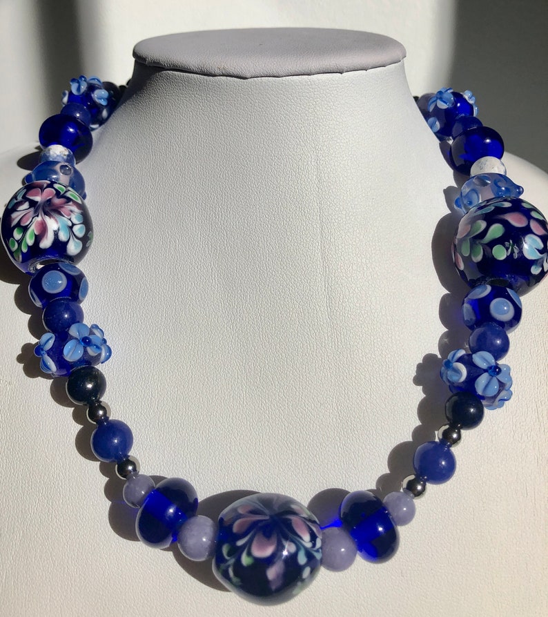 161/2 Choker made with stainless steel, lapis lazuli, torch fired beads. Cobalt blue and lavender tones. Metal leaf clasp image 3