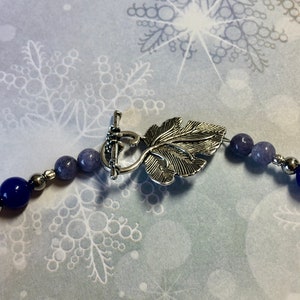 161/2 Choker made with stainless steel, lapis lazuli, torch fired beads. Cobalt blue and lavender tones. Metal leaf clasp image 6